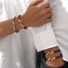 دستبند چرم زنانه با پلاک طلا طرح LV کد XB605