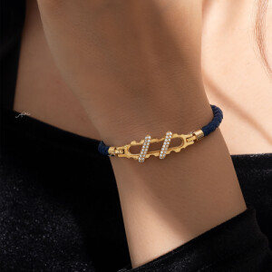 دستبند چرم زنانه با پلاک طلا طرح دنده ای کد XB622